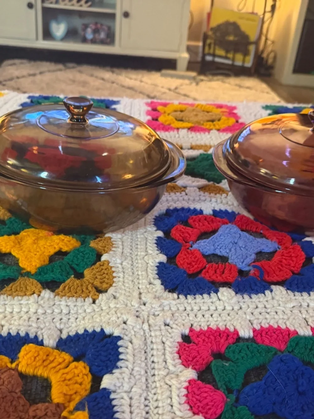 vintage Pyrex casserole dishes in gorgeous amber and cranberry glass